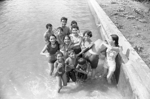 Young people in a pool, La Guajira, Colombia, 1976