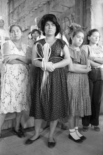 Women stand for Palm Sunday mass, San Salvador, 1982