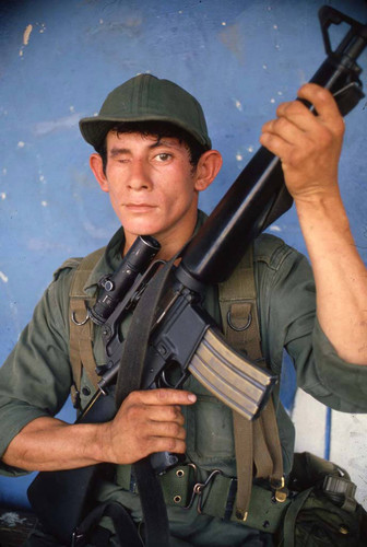 Soldier with rifle, Meanguera, Morazán, 1981