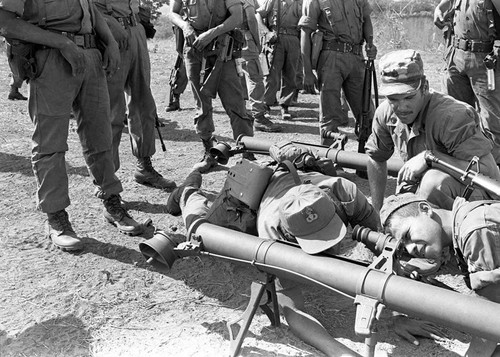 U.S. advisor training Salvadoran soldiers how to use mortars, Ilopango, 1983