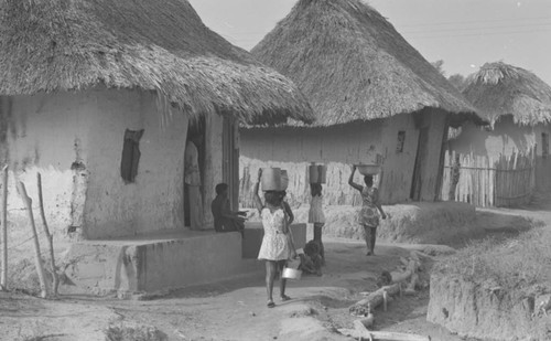 Girls carrying water, San Basilio de Palenque, Colombia, 1977