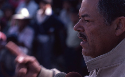 Close up image of presidential candidate Ángel Aníbal Guevara's speaking in front of a crowd, Ciudad Vieja, 1982