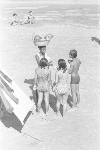 Woman selling fruit at the beach, Cartagena, ca. 1978