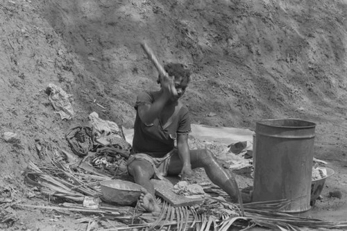 Woman washing clothes, San Basilio de Palenque, 1977