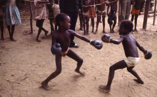 Children boxing inside a ring, San Basilio de Palenque, 1976