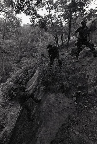 Survival school students learn to rappel, Liberal, 1982