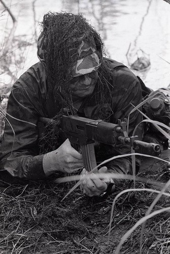 Survival school student practices silent swim techniques, Liberal, 1982