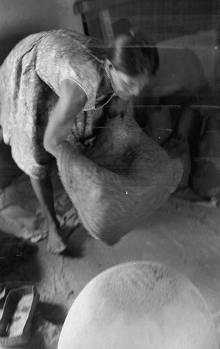 A woman making pottery, La Chamba, Colombia, 1975