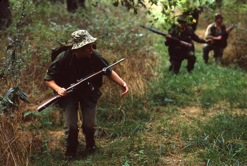 Survival school students participate in an obstacle course, Liberal, 1982