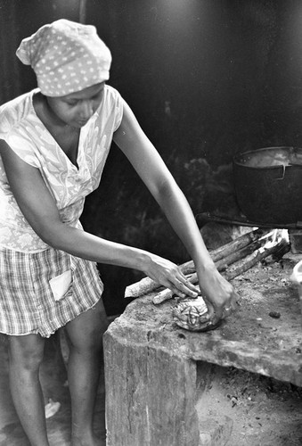 Anselma Salas cooking a turtle, San Basilio de Palenque, 1977