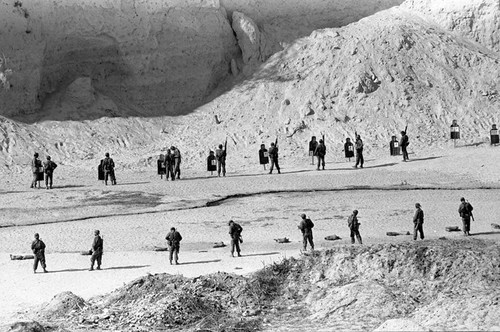 U.S. advisors training Salvadoran soldiers at a shooting range, Ilopango, 1983