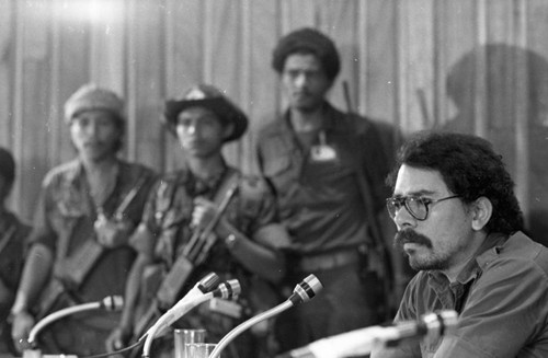 Sandinista official at a press conference, Nicaragua, 1979