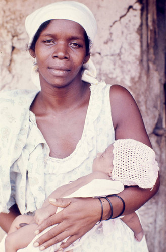 Woman holding a baby, San Basilio de Palenque, 1976