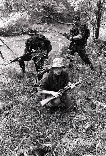 Survival school students participate in an obstacle course training, Liberal, 1982