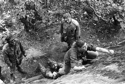 Survival school students learn to rock climb, Liberal, 1982