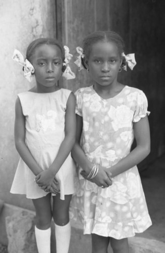 Two girls posing for a portrait, San Basilio de Palenque, 1976