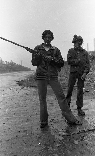 Sandinistas in the rain, Nicaragua, 1979