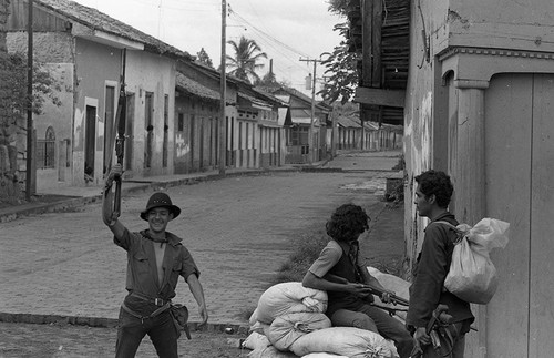 Sandinistas on a street corner, Nicaragua, 1979