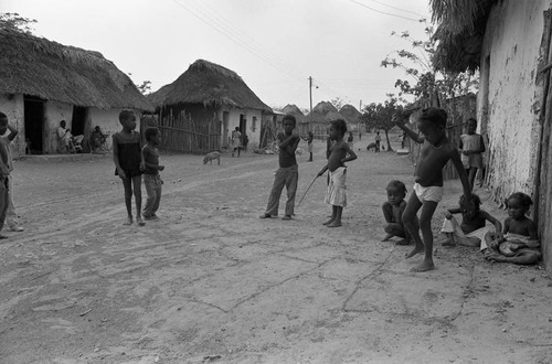 Children playing hopscotch on the street, San Basilio de Palenque, 1977