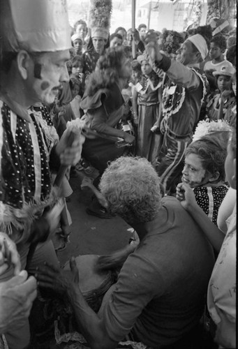 Dancers dancing among the Carnival crowd, Barranquilla, Colombia, 1977