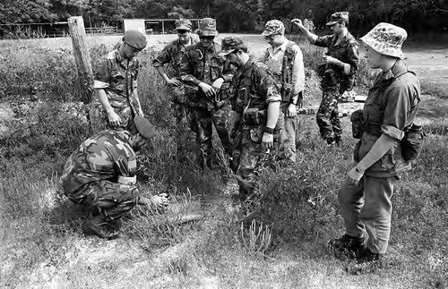 Survival school students learn about explosives, Liberal, 1982