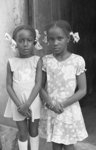 Two girls posing for a portrait, San Basilio de Palenque, 1976