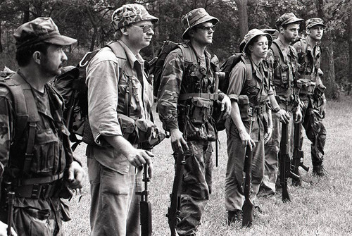 Survival school students form a military-style lineup, Liberal, 1982