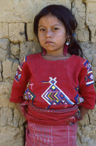 Portrait of a Mayan girl in a red corte and huipil, Chajul, 1982
