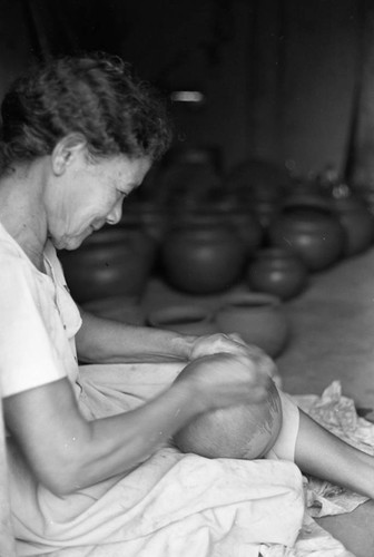 Artisan at work, La Chamba, Colombia, 1975