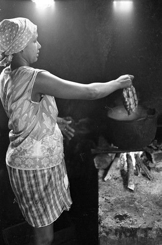 Woman cooking a turtle, San Basilio de Palenque, 1977