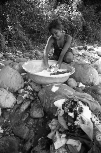 Woman washing near river, La Guajira, Colombia, 1976