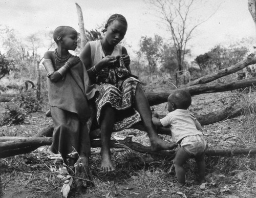 Woman sewing fabric, Tanzania, 1979