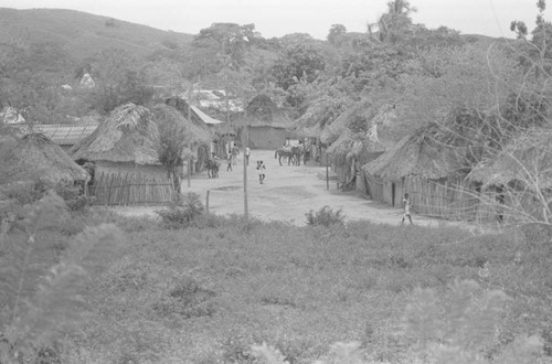 People walking on a street, San Basilio de Palenque, 1976
