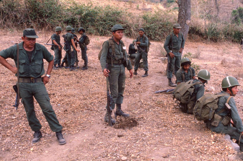 Soldiers inspecting a village, San Antonio de los Ranchos, Chalatenango, El Salvador, 1981