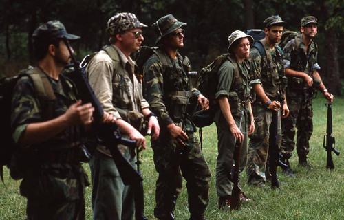 Survival school students form a military-style lineup, Liberal, 1982