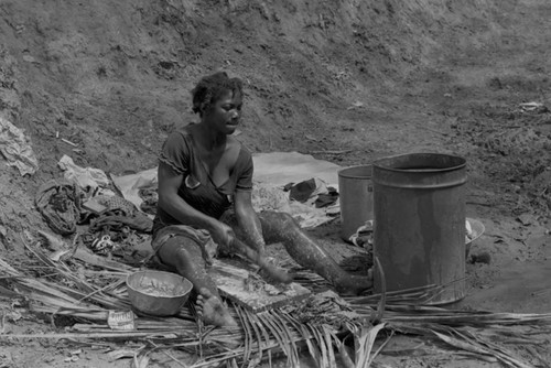 Woman washing clothes, San Basilio de Palenque, 1977