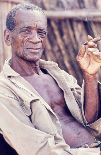 Man smoking a cigar, San Basilio de Palenque, 1976