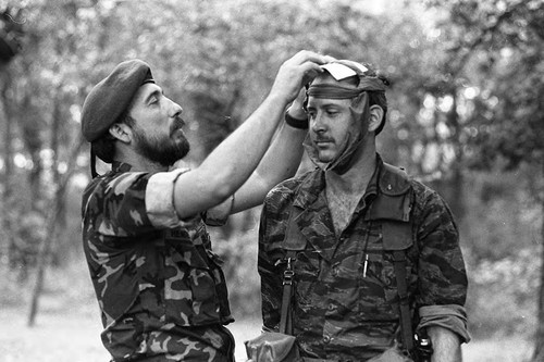 Survival school students learn first aid techniques, Liberal, 1982