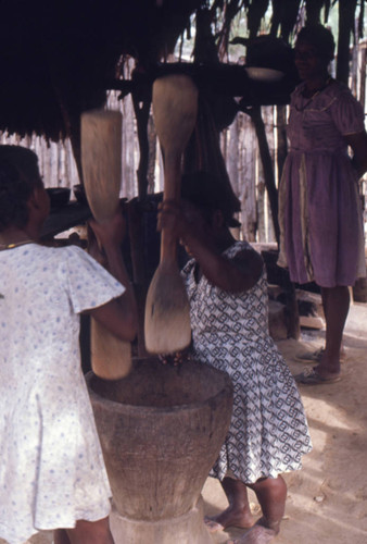 Woman grinding in a mortar, San Basilio de Palenque, 1976