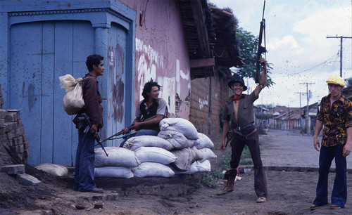 Sandinistas on a street corner, Nicaragua, 1979