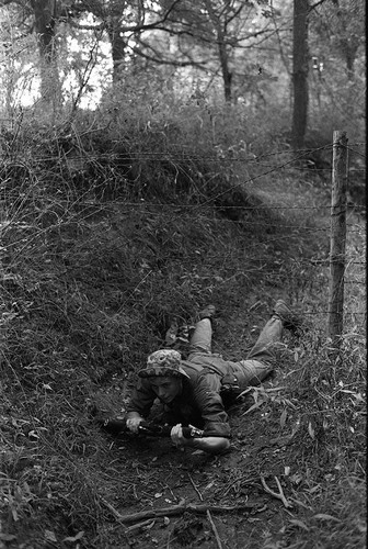 Survival school student holds a rifle, Liberal, 1982