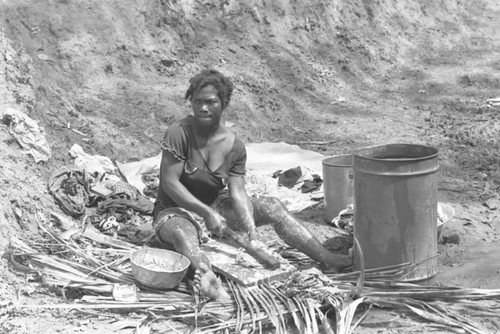 Woman washing clothes, San Basilio de Palenque, 1977