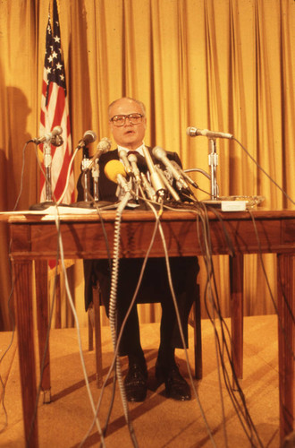 Ambassador Deane R. Hinton speaking at a press conference, San Salvador, El Salvador, 1982