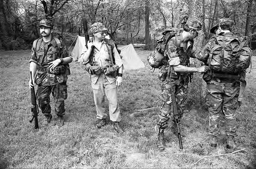 Survival school students form a military-style lineup, Liberal, 1982