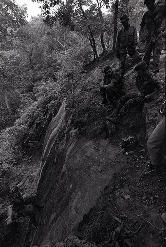 Claflin demonstrates rock climbing, Liberal, 1982