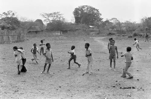 Boys playing in a dirt field, San Basilio de Palenque, 1977