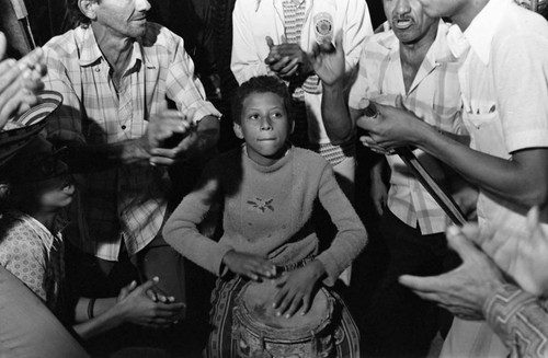 Boy playing the conga drum, Barranquilla, Colombia, 1977