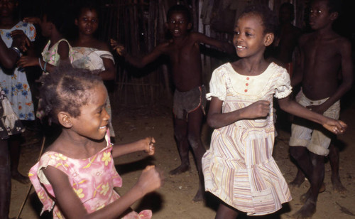 Girls boxing outdoors, San Basilio de Palenque, 1976