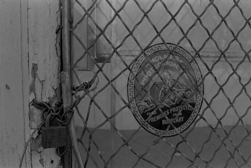 Padlock, fencing, and chain, Philadelphia, ca. 1980