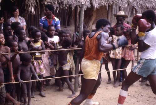 Boxers fighting inside boxing ring, San Basilio de Palenque, 1976